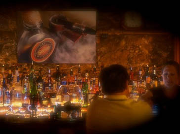 Person Talking to the Bartender